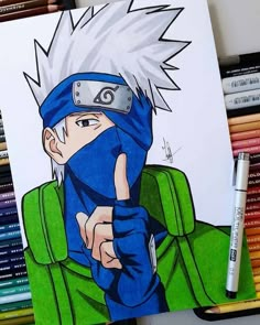 a drawing of naruto pointing to the side with colored pencils in front of him