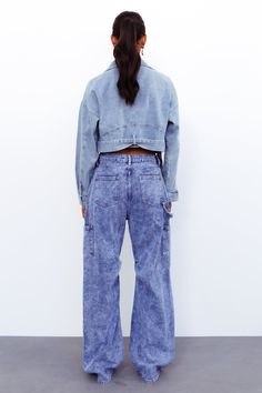 Length from shoulder to hem of size S: 46cm.鈥/li>Denim cropped jacket. Cold hand wash only. Model is a standard S and is wearing S. True to size. Mid-weight and non-stretchy, soft material. Zip closure. Cotton/Polyester. Need the perfect way to cap off your 'fit Try out the Aine Cropped Jacket which features long sleeves with a button closure, collars, a waist belt and a zip-up closure. Style yours with your fave midi dress and sneakers. Midi Dress And Sneakers, Dress And Sneakers, Denim Cropped Jacket, Jacket Denim, Children Shoes, Cropped Denim Jacket, Cropped Jacket, Crop Jacket, Waist Belt