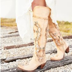 Dress Up Any Outfit With A Gorgeous Pair Of Knee High Cowgirl Western Boots From Junk Gypsy. These Boots Are Made With Distressed/Aged Cream Or Light Tan Colored Leather, A Scalloped Overlay On The Foot And Shaft, Cactus Details Inlays, And A Stylish Snip Toe. Zipper Part Way Up The Inside Of Each Shaft For Ease In Getting Them On. Amazing Quality Boots That Feature A Pretty Pink Leather Lining, Snip Toe, Leather Outsoles And Stacked Leather Heel. Slip Into These Boots As You Head To Work Or To The Dance Floor. Dance The Night Away In These Stylish Knee High Boots From Junk Gypsy. Make Stunning Boots For A Country Wedding!! 23" Shaft Height 2.75" Heel Size 6 (Ladies Regular Width) Excell Cactus Boots, Floor Dance, A Country Wedding, Lane Boots, Leather Cowgirl Boots, Handmade Boot, Western Wear For Women, Cowgirl Western, Fringe Boots