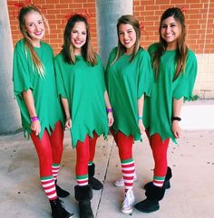 three girls dressed in green and red are posing for the camera while wearing matching outfits