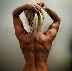 the back of a woman's body is shown in this instagramtion photo