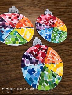 three pieces of paper that have been made to look like stained glass ornament