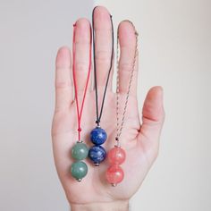 This BaeJuju is your multi-use crystal companion! Have it with you as a bracelet & remove it to utilize as a toy or a pendulum. The stones are free to move so it can transformed in a variety of ways:⚪️〰️⚪️ - Beads separated to be used as a begleri (Greek skill toy)⚪️⚪️〰☝️ - Beads together to swing as Longshot (fidget/skil toy)🔔 - Beads together to hang as a pendulum🤲 - Back to bracelet whenever done!⠀ Great for:▪️ Relaxing▪️ Stress relief▪️ Finger dexterity▪️ Fidgeting▪️ Meditation⠀ We use Adjustable Everyday Crystal Necklaces, Adjustable Crystal Necklaces With 8mm Beads For Gifts, Adjustable Crystal Necklaces With Round Beads For Everyday, Everyday Adjustable Crystal Necklaces With Round Beads, Multicolor Beaded Bracelets, Pony Bead Patterns, Diy Crystals, Bracelet Gemstone, Rock Collection