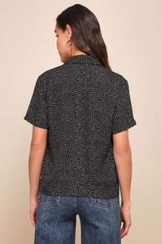 It's easy to dress for success when you have the Lulus Good Luck Charm Black Polka Dot Short Sleeve Button-Up Top in your closet! This classic collared top has a full button and loop placket running the length of its breezy, woven fabric bodice. This sweet little top keeps the charm going with its boxy silhouette and front patch pocket, perfect for transitioning between casual cool and office chic! Fit: This garment fits true to size. Length: Size medium measures 24" from top to bottom. Bust: Great for any cup size. Waist: Not Fitted - comfortable room throughout midsection. Undergarments: May be worn with any standard bra. Fabric: Fabric has no stretch. Unlined and slightly sheer. 100% Polyester. Hand Wash Cold. Do Not Bleach. Line Dry. Iron Low Heat. Imported. Lulus | Good Luck Charm Bla Black Top With Button Closure And Collared Neckline, Black Collared Top With Button Closure, Black Tops With Collared Neckline And Buttons, Black Tops With Buttons And Collared Neckline, Black Tops With Buttoned Collared Neckline, Black Collared Top With Buttons, Polka Dot Blouse With Button Closure For Workwear, Polka Dot Button-up Blouse For Work, Casual Polka Dot Blouse With Buttons