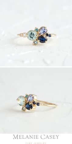 Aquamarine, deep blue sapphire, and tanzanite form a cool-toned constellation in the eye-catching Clear Water Ring, accented by the subtle glimmer of small white diamonds. Find this piece in solid 14k yellow, white, and rose gold on melaniecasey.com! Modern Blue Multi-stone Jewelry, Blue Multi-stone Cluster Ring, Blue Multi-stone Aquamarine Jewelry, Blue Aquamarine Multi-stone Jewelry, Blue Gemstone Cluster Ring Fine Jewelry, Blue Cluster Ring With Rose Cut Diamonds For Anniversary, Blue Cluster Rings With Accent Stones, Blue Cluster Rings With Multi-stone, Blue Diamond Multi-stone Cluster Ring