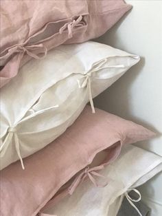 four pillows stacked on top of each other