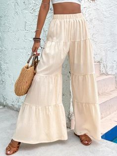 Unleash your inner free spirit with our Boho Ruffled Hem Wide Leg Pants! The flowy and comfortable design will keep you cool and stylish, while the ruffled hem adds a touch of bohemian charm. Perfect for any occasion, these pants will bring out your unique and adventurous side. 100% Polyester Brand Size Dress Bust Waist Hip XS 0-2 31-32.5'' 23-24'' 31-34" S 4--6 33-35'' 25-26'' 35-37" M 8--10 35-36'' 27-28'' 38-39" L 12--14 38-40'' 29-31'' 40-42" XL 14-16 40-42'' 33.5-36'' 44-46" 2XL 18-20 42-44'' 37-40'' 47-50" 3XL 22-24 44-46'' 41-46'' 51-55" 4XL 26-28 46-48'' 47-50'' 56-60" Beige Boho, Winter Knit Hats, Boot Accessories, Black Ruffle, Winter Knits, Free Spirit, Autumn Summer, Ruffle Hem, Leg Pants