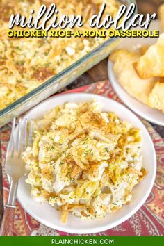 a white plate topped with food next to a casserole covered in chicken and cheese