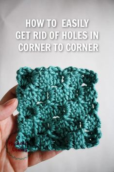 someone is holding up a crocheted square with the words how to easily get rid of holes in corner to corner