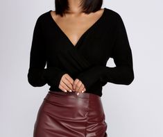 Wrap yourself in this cozy find to complete your look! It features a plunging wrap V neckline. long sleeves and a cropped hem with a wide waistband. Top is composed of a brushed knit fabric that offers a relaxed fit with a moderate stretch. Knit Crop Top, Knit Crop, Wide Waistband, V Neckline, Top Sales, Black Crop Tops, Trending Now, Knit Top, Leather Skirt