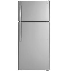 a silver refrigerator freezer sitting on top of a white counter