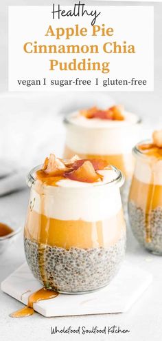 two jars filled with chia pudding sitting on top of a table