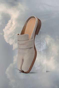 None Luxury Slip-on Mules For Spring, Luxury Spring Mules With Rubber Sole, Designer Slip-on Mules For Spring, Designer Single Toe Strap Mules For Spring, Designer Spring Mules With Leather Sole, Designer Slip-on Mules With Rubber Sole, Designer Slip-on Mules With Closed Toe, Maison Margiela Tabi