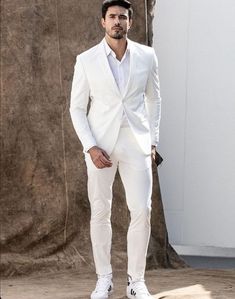 Men White Suits, Grooms Wear Suits, Wedding 2 Piece Suit, Events Wear Jacket And Pant, Gift For Him, White Grooms Suits.                  WELCOME TO MY SHOP                        SFJOYAFASHION  (PLEASE MEASURE YOUR CHEST AREA, CIRCUMFERENCE AROUND THE BROADEST PART OF YOUR CHEST, AND WAIST AREA WHERE YOU NORMALLY WEAR YOUR TROUSER OR 4 FINGER BELOW THE BELLY BUTTON, AND PICK YOUR SIZE ACCORDINGLY) PROVIDE YOUR HEIGHT AND WEIGHT IN THE PERSONALISATION BOX, WHILE PLACING THE ORDER. This black Fashion 3-piece suit With Matching Waistcoat And Trousers for Men Is Perfect For Everyone Who Loves formal Suits. This Designer Suit will be Handcrafted Specially For You only after You Place an Order. Fabric:- Imported Premium Includes:- Jacket  Vest, Trouser  REQUIRED CUSTOM MEASUREMENTS- JACKET MEAS White Slim Fit Long Sleeve Sets, White Slim Fit Suit For Groom, White Slim Fit Tuxedo For Wedding, White Slim Fit Suit With Notch Lapel, White Slim Fit Notch Lapel Suit, White Notch Lapel Slim Fit Suit, White Three-piece Wedding Suit, White Slim Fit Tuxedo Suit, White Notch Lapel Wedding Sets