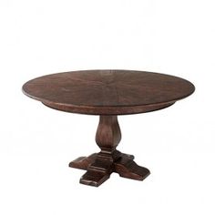 a round wooden table with two pedestals on one end and an oval shaped top