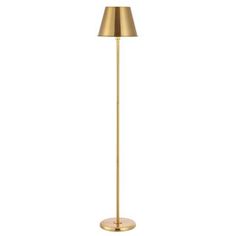 a gold floor lamp with a white background