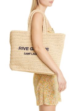 Perfect when you're toting a lot but still want to look Left Bank-chic, this spacious crochet tote features rolled leather top handles and a bold logo. 14.96"W x 13.77"H x 5.70"D Open top Top carry handles Unlined Textile Made in Italy Designer Handbags Designer Beige Crochet Tote Bag, Designer Rectangular Crochet Shopping Bag, Designer Crochet Tote Bag For Travel, Designer Beige Crochet Shopping Bag, Designer Crochet Bag With Leather Handles For Shopping, Designer Crochet Bag For Summer, Luxury Crochet Shopping Bag For Summer, Designer Summer Crochet Tote Bag, Designer Crochet Bag With Braided Handles For Summer