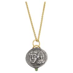 Astros Coin Charm Amulet Pendant Necklace with Emerald, 24kt Gold and Silver by Prehistoric Works of Istanbul, Turkey. Emerald - 0.03cts. These coin amulets pair well alone or with other coin pendants or with miniature pendants. Measures: 18.7mm x 22.5, weighs: 4.4 grams. Comes with 16" gold vermeil chain. Theater became significant to general Greek culture when it became an integral part of a festival honoring the god Dionysus. The fact that every Greek city of any size had a theatre and sometimes more than one ( Attica had several) is an indication of their importance to the community. The theatre offered an experience which brought together elements of myth, ritual, religion, dance, music and literature. Engraved Byzantine Necklace For Ceremonial Occasions, Gold Round Hallmarked Emerald Necklace, Gold Round Emerald Necklace Hallmarked, Gold Spiritual Emerald Necklace, Spiritual Gold Emerald Necklace, Gold Spiritual Round Emerald Necklace, Greek Culture, 24kt Gold, Coin Pendant