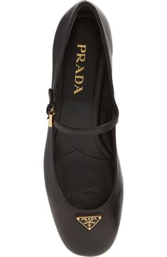 "Find PRADA Modellerie Mary Jane Pump on Editorialist. Prada's iconic triangle logo highlights the rounded toe of this mary jane–style pump crafted of smooth lambskin leather and set on a low block heel. 1 1/2\" (38mm) heel (size 38.5) Adjustable strap with buckle closure Leather upper, lining and sole Made in Italy Designer Shoes" Mary Jane Pumps, Low Block Heels, Triangle Logo, Lambskin Leather, Women's Pumps, Mary Janes, Designer Shoes, Block Heels, Prada