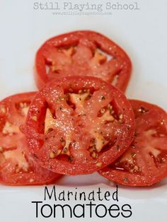 three sliced tomatoes with seeds on them and the words marinated tomatoes written below it