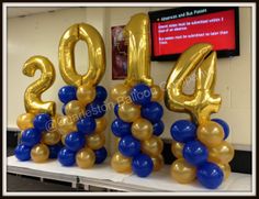 balloons are arranged in the shape of numbers for new year's eve party decorations