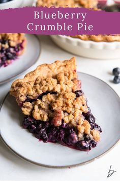 a slice of blueberry crumble pie on a plate