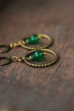 Unique brass earrings with green agate stone 8 mm beads, small green czech glass 3 mm beads, antique brass open ring pendants and antique brass lever back earring hooks. Earring hooks are from nickel free and lead free metal. *The total lenght of earrings is about 48 mm including earring hooks. Other earrings of my shop you can see here: https://www.etsy.com/shop/NaTavelli?section_id=13757927  Thanks for visit. Agate Stone Jewelry, Green Pearl Earrings, Sailor Bracelet, Purple Drop Earrings, Boho Earring, Open Rings, Stick Earrings, Brass Rings, Agate Earrings