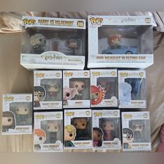 many harry potter pop vinyls are on display