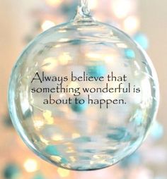 a glass ornament with the words always believe that something wonderful is about to happen