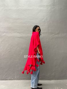 This is a warm knit poncho that is very light and stylish even if you just put on it lightly. It's a stylish product with any style such as leggings or jeans. The sleeves are open-style. ❤️Please see the professional model of Stylepark1 Her body size is medium size And Tall 174cm 5.72FT for the American size. Please look at the fit style of the model.❤️ Size - One size ( one size all fit) Width: 110cm /43.30inch Length - Back  (with tassel) 105cm /41.33inch/3.44ft Front - with tassel 70cm/27.55i Bohemian Winter Vacation Sweater, Cozy Fall Poncho For Beach, Winter Cape With Tassels, Casual Poncho For Beach Cover-up In Fall, One Size Poncho For Fall Vacation, One Size Fall Poncho For Vacation, Oversized Bohemian Outerwear With Fringe, One Size Poncho For Vacation In Fall, Long Sleeve Fringe Poncho