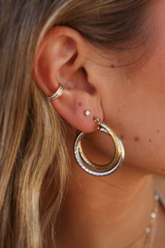 Mixed metals are having a major moment, and the Vice Versa Earrings are our take on this trend. The hammered surface catches the light and makes these already-elevated earrings shine in your ears. Pair with virtually any look you're wearing - the Vice Versa earrings are our go-to when we can't decide what hoop to wear. Stainless Steel Hypoallergenic + Tarnish Resistant Dimensions: 30 mm Sold as pair Victoria Garrick Browne is a viral content creator, founder, and public speaker who isn't afraid Hammered Earrings For Everyday Wear, Everyday Hammered Earrings, Hammered Gold Wrap Earrings, Victoria Garrick, Public Speaker, Mixed Metals, Content Creator, Speaker, In This Moment