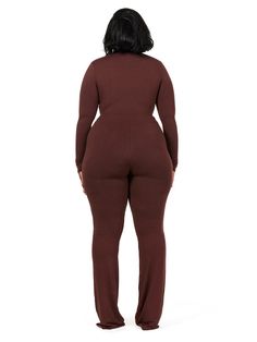 This bootcut pant features a high and elastic waistband with curve hugging action. Has stretch with all the bodycon comfort. Style with your favorite tops and bodysuits to complete the vibe. NW Collection Import 95% Viscose, 5% Spandex Model wears size 1X True to size This pant is double-lined Inseam: Size 2X - 35.75" Stretch Wide Leg Jumpsuits And Rompers For Fall, Stretch Wide Leg Jumpsuits For Fall, Fitted Wide Leg Jumpsuits For Loungewear, Fitted Long Sleeve Top With Thumbholes, Moisture-wicking Fitted Long Sleeve Set, Fitted Brown Loungewear Pants, V-neck Top With Ribbed Cuffs For Loungewear, Gesture Practice, Moisture-wicking Long Sleeve Stretch Crop Top