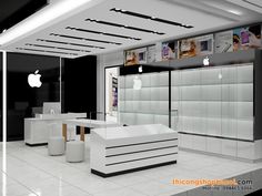 an apple store with white counter tops and black walls