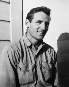 black and white photograph of a man smiling