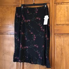 Nwt Vintage Notations Woman Vintage Black Skirt With Pink And Coral All Over Subtle Floral Print With Gorgeous Lace Detail Inlets At The Ruffle Bottom. Size 2x. 26 Inches Long. Waist 18.5 Inches Across Laying Flat. 95% Nylon 5% Spandex. Brand New No Flaws From A Smoke Free Home. Price Is Firm. Gorgeous Spring Or Summer Skirt! Black Floral Skirt, Boho Lifestyle, College Fits, Future Wardrobe, Church Decor, Summer Skirts, Black Skirt, Lace Detail, Black Floral