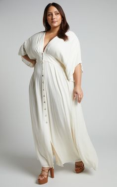 Sitting Pretty Maxi Dress In Natural | Showpo USA Flowy V-neck Maxi Dress With Buttons, V-neck Maxi Dress With Buttons For Daywear, V-neck Maxi Dress With Button Closure For Daywear, V-neck Maxi Dress With Buttons For Date Night, Spring Beach Maxi Dress With Button Closure, Spring Vacation Maxi Dress With Button Closure, V-neck Maxi Dress With Button Closure For The Beach, Beach Maxi Dress With Buttons, V-neck Daywear Maxi Dress With Button Closure