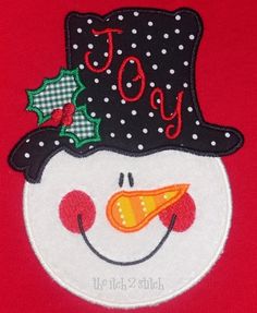 a close up of a snowman wearing a hat