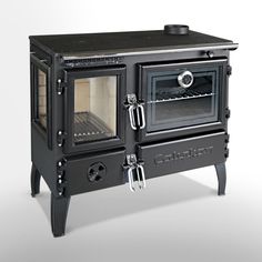 an old fashioned black stove with its door open