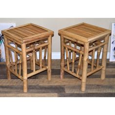 two wooden stools sitting on top of a hard wood floor