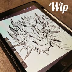 a tablet with an image of a dragon on it and the words wip above it