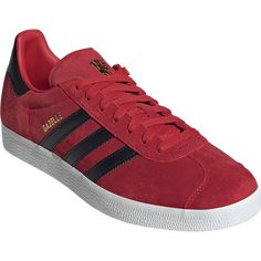 adidas Gazelle Manchester United Soccer Shoe Manchester United. Show your support for Manchester United with a timeless shoe, dedicated to the Red Devils. Experience adidas Originals comfort and a crispy clean design with these low-profile men's shoes. Created for a classic fit, the supple suede upper adds a touch of subtle texture. Meet the world with a discerning taste, stay on the move, and enjoy all-day comfort with the iconic three-stripe detailing and a cushioned insole. Red Adidas Sneakers With Round Toe, Lace-up Adidas Sneakers In University Red, Classic Lace-up Sneakers In University Red, Classic University Red Sneakers With Rubber Sole, Adidas Red Sneakers With Three Stripes, Red Adidas Sneakers With Three Stripes, Classic University Red Sneakers With Cushioned Footbed, Soccer Lifestyle, Campus Sneakers