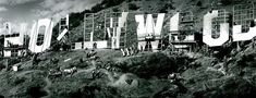 black and white photograph of the word job written in large letters on top of a mountain