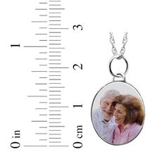 Make your memories last with this personalized small oval photo necklace. Crafted in 10K white gold A photo of your choice appears on the front of the charm and your message is engraved on the back The oval charm measures 16.88 x 22.75mm The 18-inch rope chain secures with a spring ring clasp Please follow these steps: 1) Place your order; 2) Text your photo from your smartphone to (330) 435-8997; and 3) When prompted, please respond with your Order Confirmation #. Standard text messaging rates may apply. Text Messaging, Order Confirmation, Photo Necklace, Photo Charms, 1 Place, Personal Photo, Necklace Sterling Silver, Text You, Rope Chain