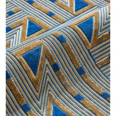 a blue and gold tie with an abstract design on the bottom half of it's neck