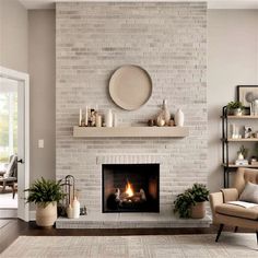 a living room filled with furniture and a fire place in front of a brick wall