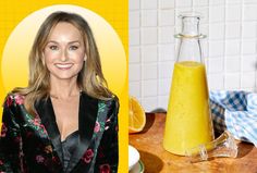 a woman standing in front of a bottle of orange juice next to a wooden cutting board