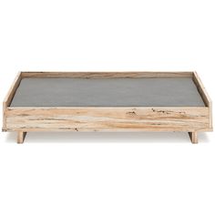 a large wooden tray with concrete in the middle and legs on each side, sitting on top of a white surface