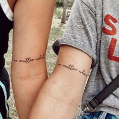 two people with tattoos on their arms that say, i'm not meant to be married