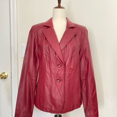 Beautiful Women’s Genuine Leather Lamskin Excellent Quality Coat. Size M. New Without Tags. Never Worn. Button Closure. Two Pockets On The Front. Great For Fall And Winter. Approximate Measurements Flat Across: - Shoulders (Farthest Point): 13 Inches - Bust: 15 Inches - Waist: 12 Inches - Hips: 15.5 Inches - Length: 48 Inches - Sleeve Length: 26 Inches Feel Free To Ask For More Details. Smoke And Pet Free Home. Offers And Bundles Are Welcome. T. Classic Red Leather Jacket With Button Closure, Red Leather Jacket With Button Closure For Work, Fitted Red Leather Jacket With Button Closure, Classic Red Leather Jacket For Work, Fall And Winter, Leather Coat, Genuine Leather, Leather Jacket, Jackets For Women