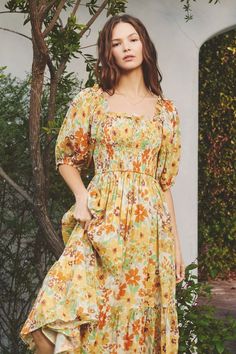 -Color: Spring Garden -Floral print midi dress -Elastic square neckline -Smocked bodice -Ruffled hem and puff sleeves -Lined -Side pockets -Content: Shell: 83% Rayon, 17% Nylon; Lining: 100% Cotton -Imported -Model is 5'9" and wearing size Small Flower Midi Dress, Church Clothes, Church Fits, Church Dress, Forest Theme, Boho Chic Outfits, Floral Print Midi Dress, Print Midi Dress, Church Outfits